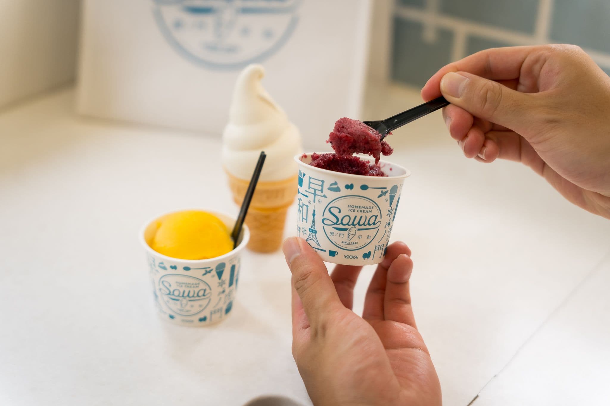 Taking a spoonful of fruit sorbet